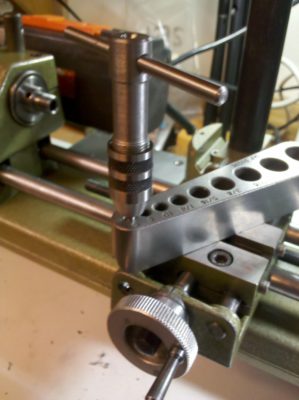 Taping for the opposing set screws for adjusting the Unimat cross slide alignmen...